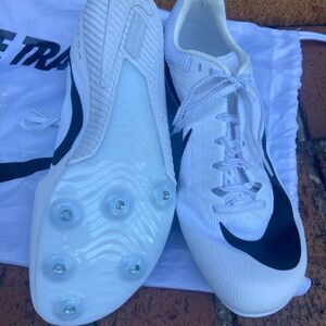 Nike White and Black Athletic Cleats. Brand new NEVER WORN